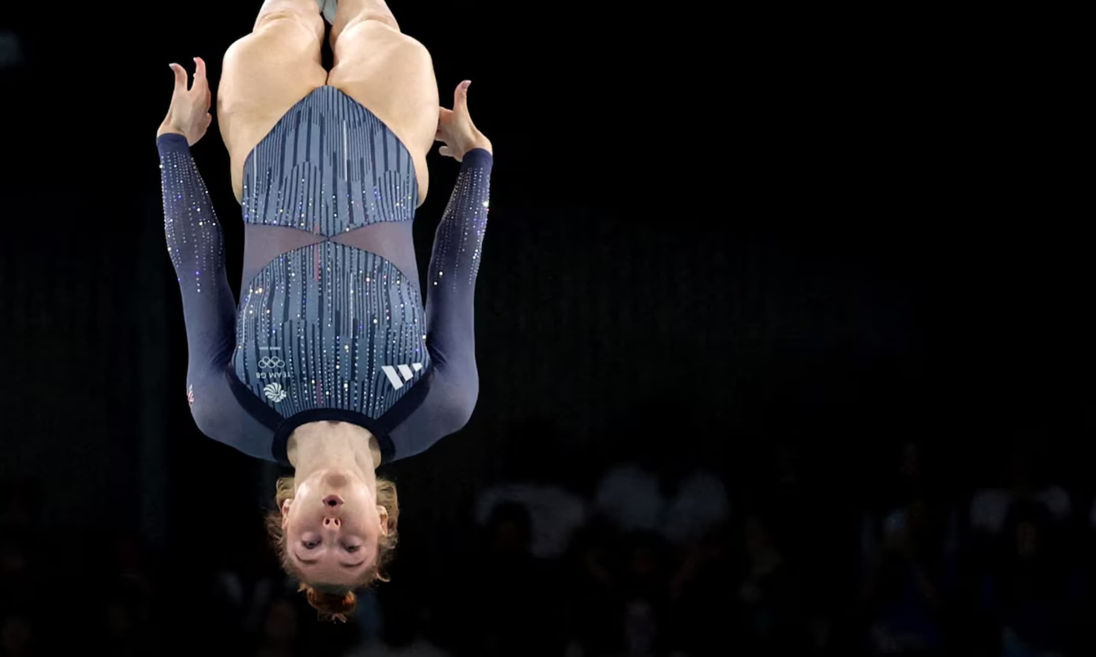 Britain’s Isabelle Songhurst makes a face while performing her trampoline routine.